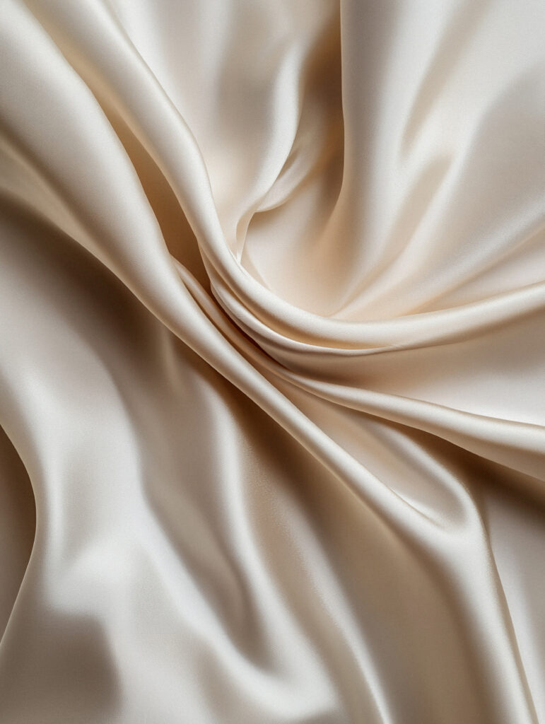 Softly draped silk fabric used in a photoshoot in a portrait studio in stockholm